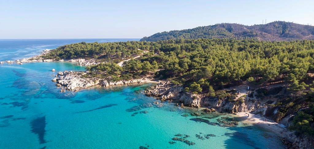 Ksamil Albania hidden village — turquoise water and boats