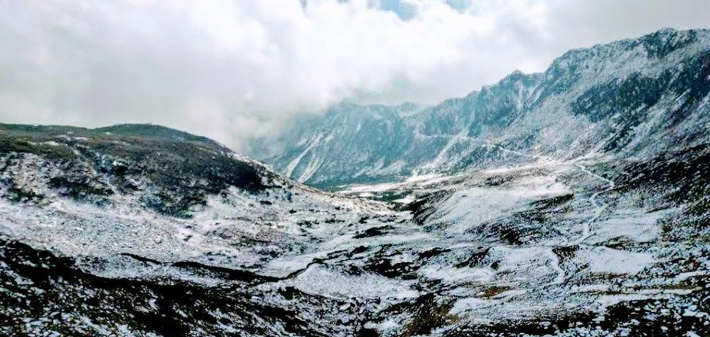 Madhuri Lake Tawang Arunachal Pradesh India — snow peaks and still water