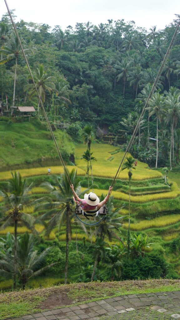Ava enjoying Bali jungle swing with rice fields view in Ubud